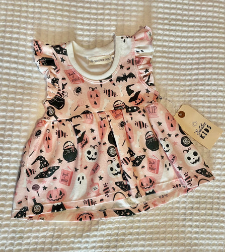 Book of Spells Halloween Ruffle Peplum Top